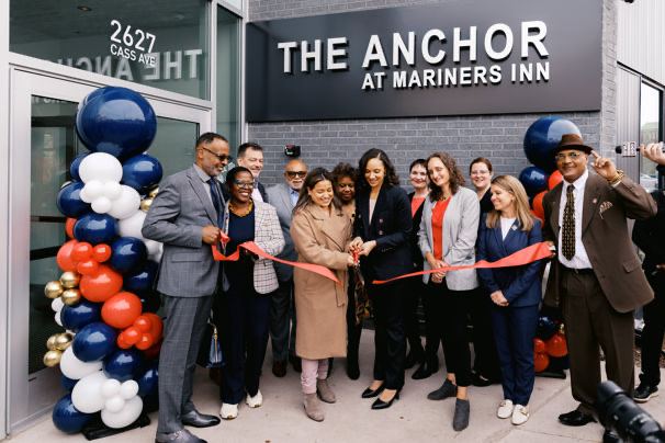 Ribbon cutting at the entrance of The Anchor at Mariners Inn on Cass Avenue in Detroit